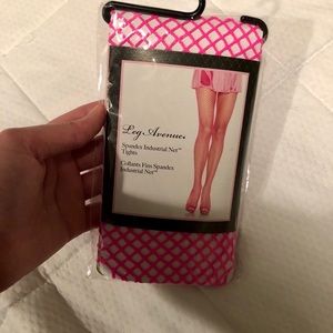 Neon pink fishnet tights